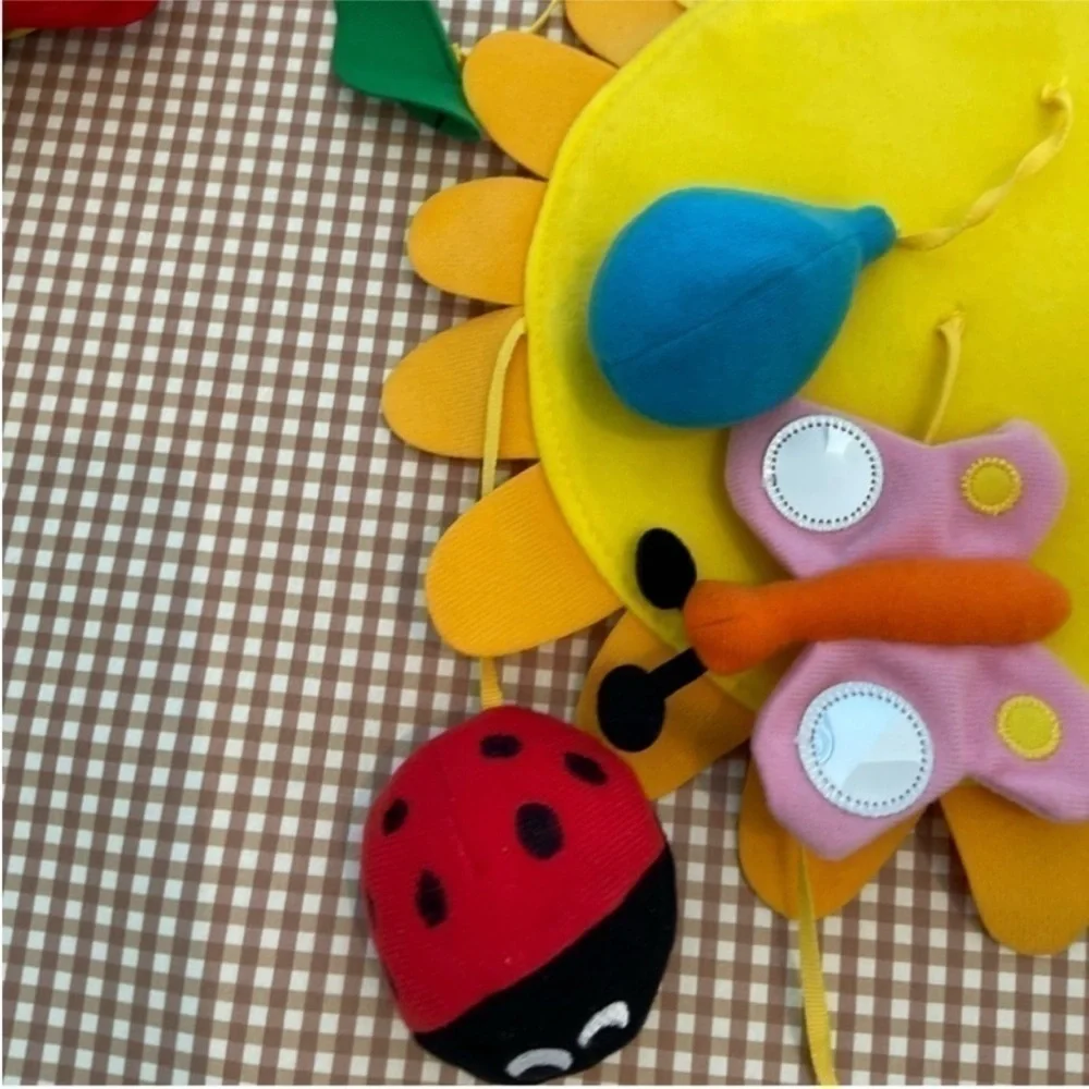 Tummy‎ time mirror/Lamaze puppy squeaker/ IKEA colorful mobile